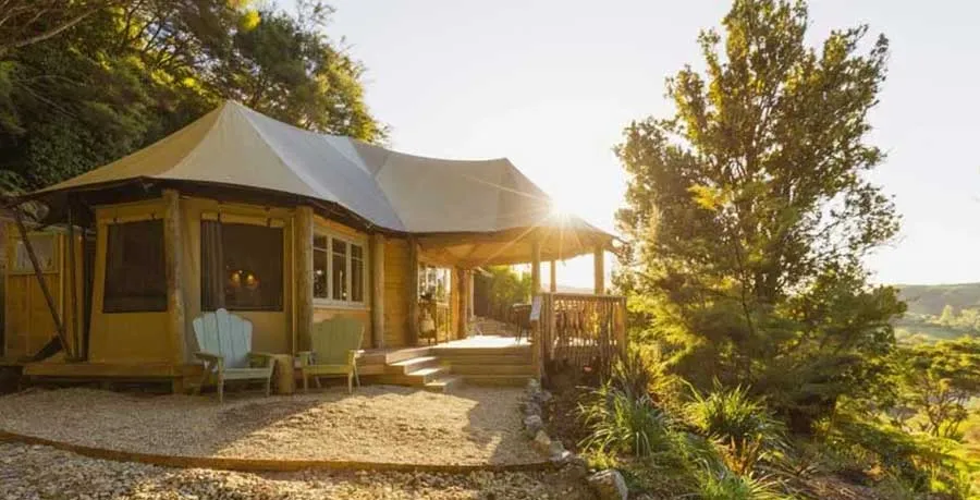 tarata tent canopy camping escapes waikato nz new zealand glamping travel couples retreat outdoor bath hot tub nature new